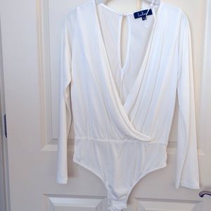 Never been worn Deep V Bodysuit